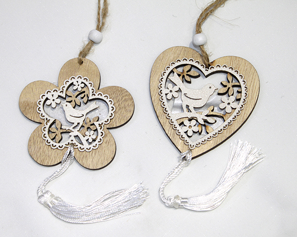 Wooden flower or wooden heart decorated with tassel and