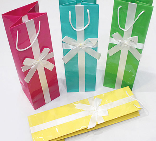 Gift bag, beautifully shiny surface, 10x10x35cm, bottle