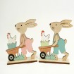 Sweet wooden rabbit with chicken and wagon, on a stand